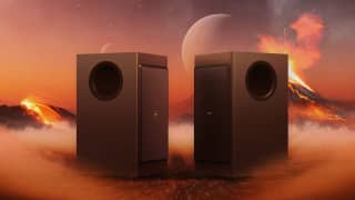 Nakamichi modular dual-opposing 8 inch subwoofer in a cinematic volcanic scene